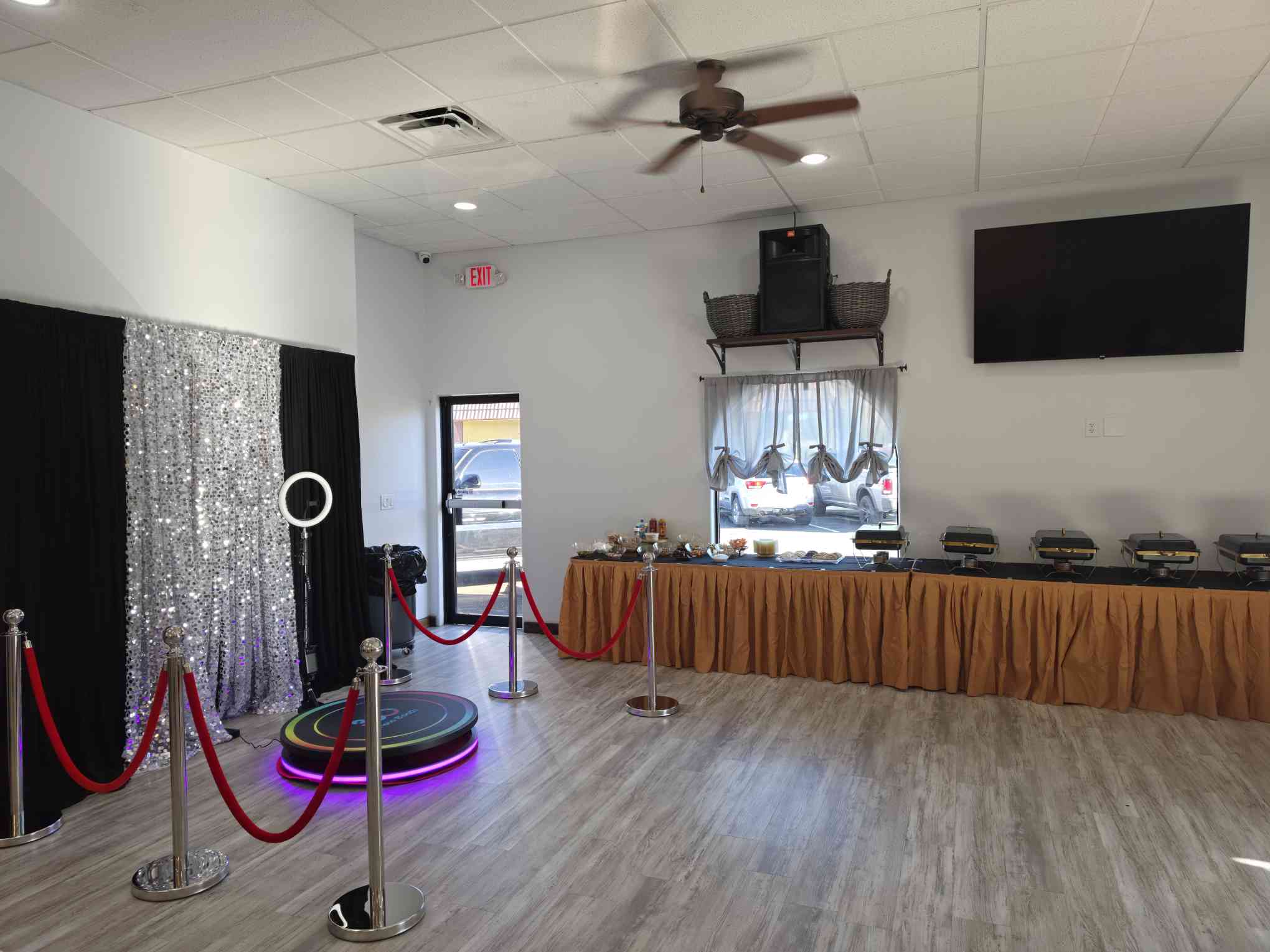 360 booth corner with glitter backdrop and stanchions